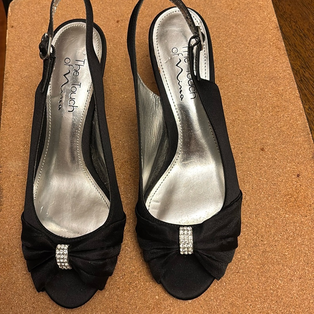 Beautiful satin open toe heels with rhinestone accent.